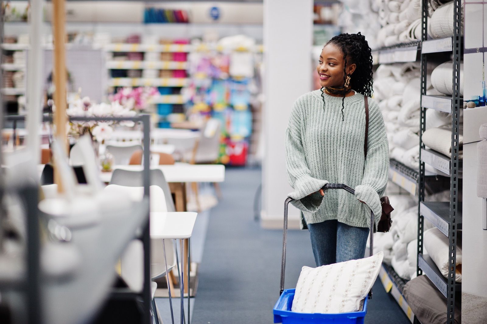 Shopper browsing a modern home furnishings store